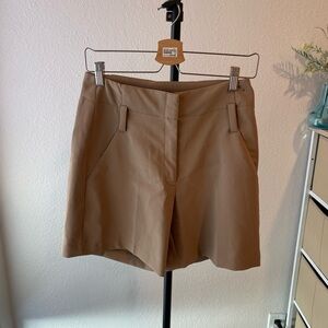 Tailored brown shorts. High waisted tailored shorts